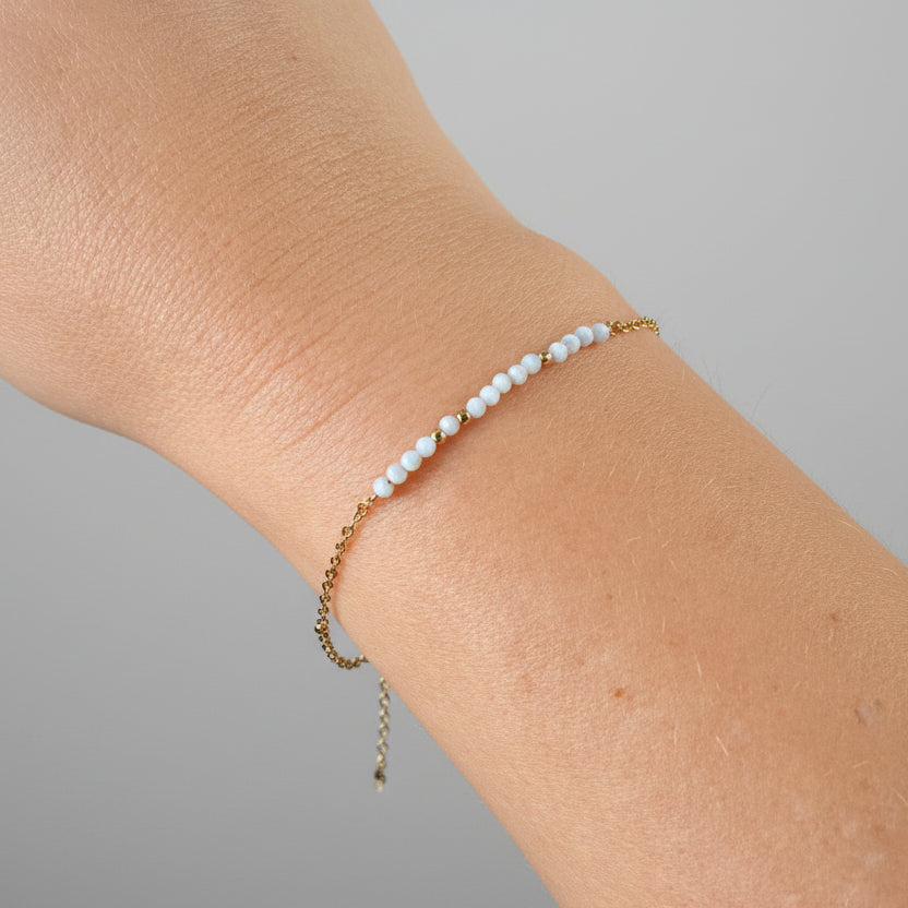 Armband goud schelpsteen