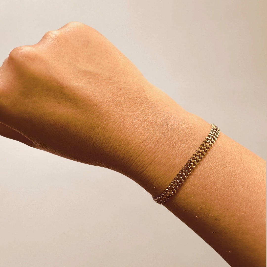 Armband goud brede platte schakel - Sieradenkaart