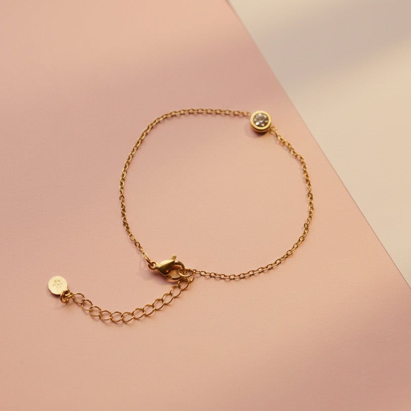 Armband goud enkel steentje - Sieradenkaart