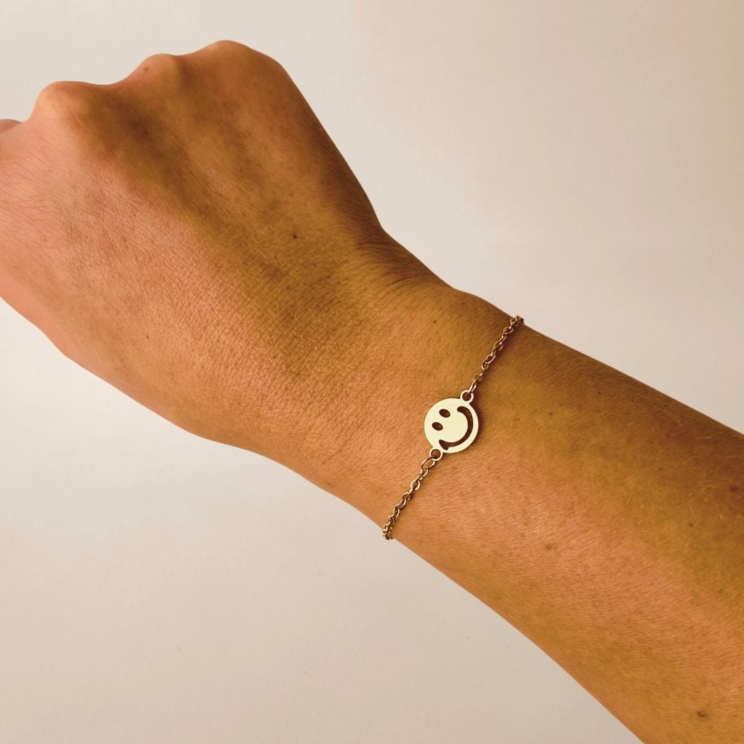 Armband goud smiley - Sieradenkaart