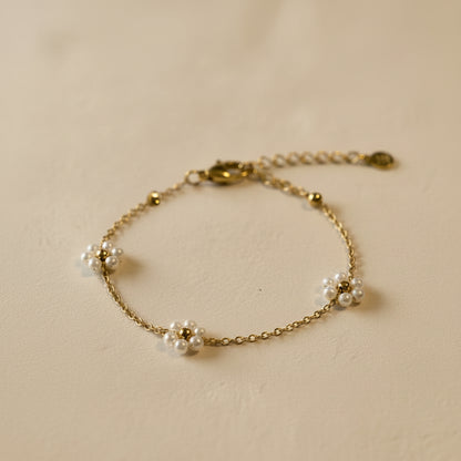 Armband goud madeliefjes parels