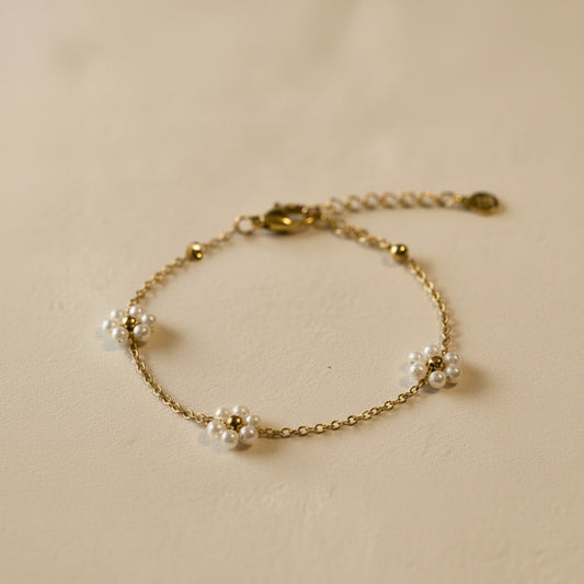 Armband goud madeliefjes parels