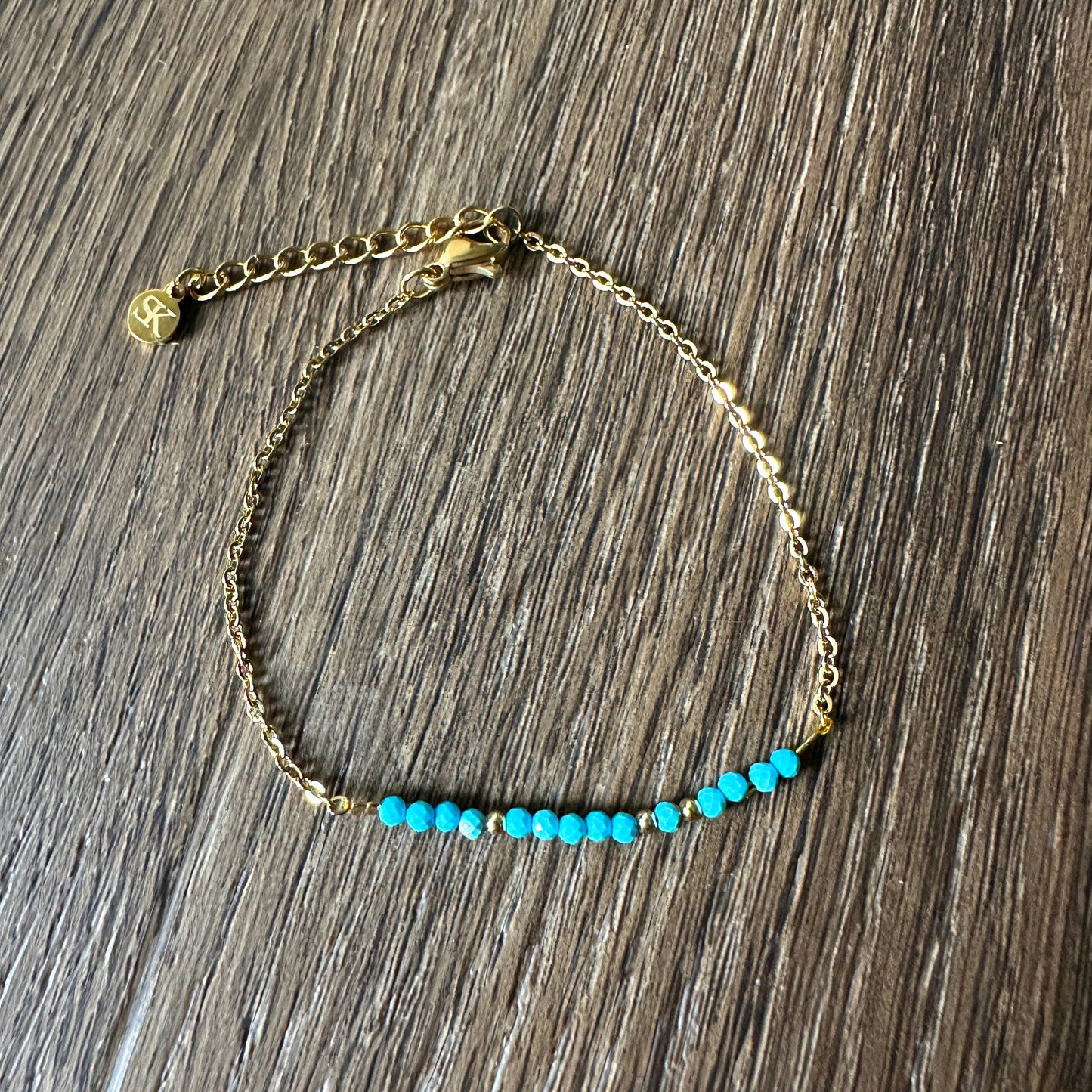 Luxe wenskaart turkoois met armband goud