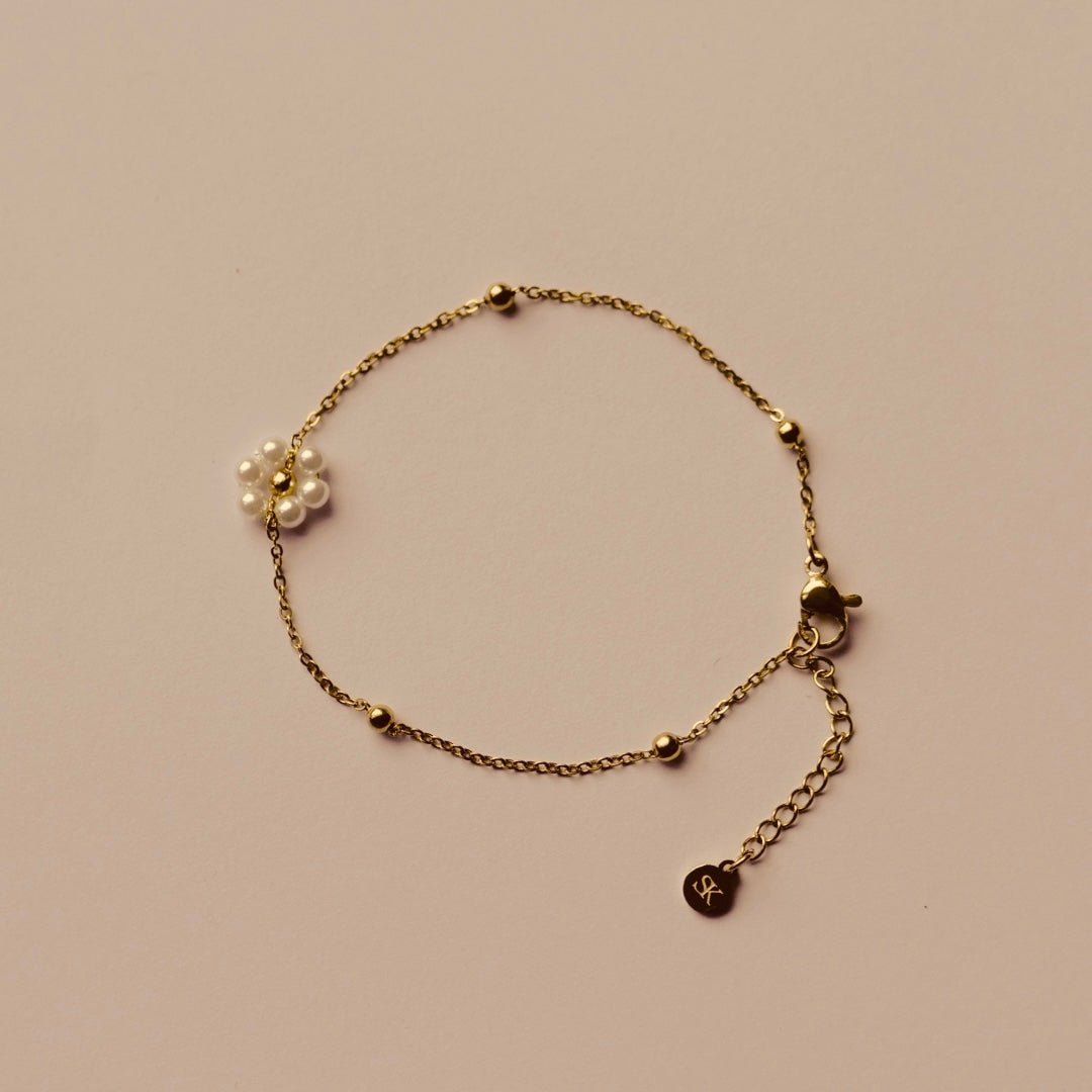 Armband goud madeliefje parels - Sieradenkaart